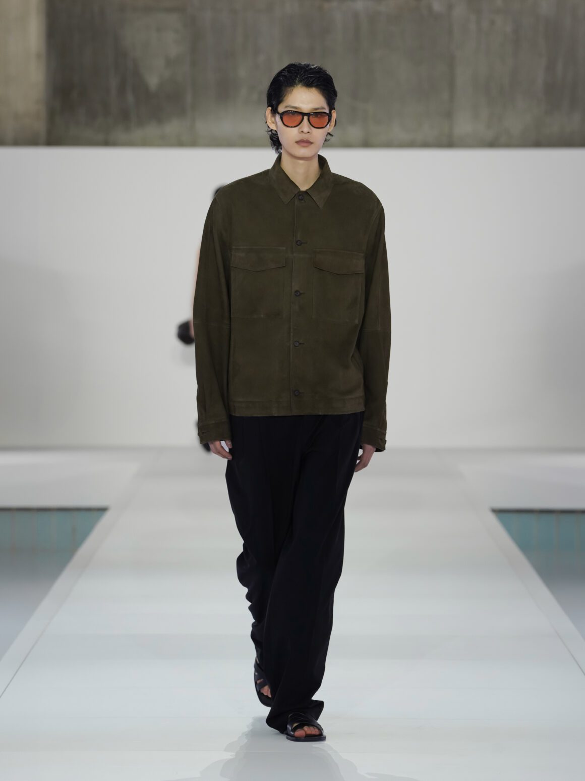 COS Stages a Cinematic Debut in Seoul with Its Spring Summer 2026 Collection 5 Model in stylish olive green outfit