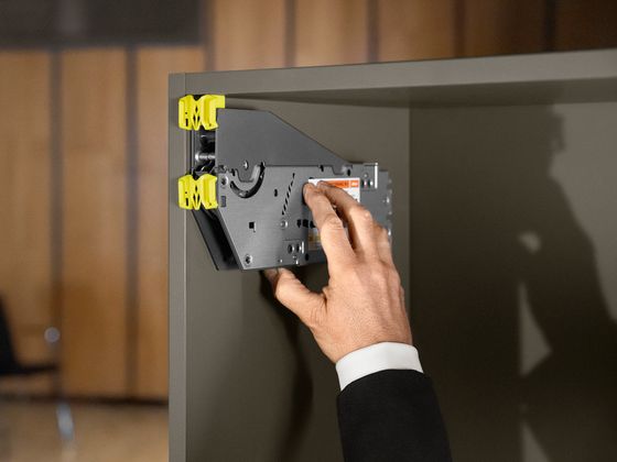 Blum Australia: The Engineering Behind Your Kitchen's Hinges and Drawers 6 Blum AVENTOS lift mechanism opening an overhead kitchen cabinet door