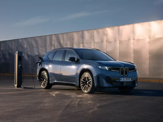 BMW iX3 charging at a public DC fast-charging station