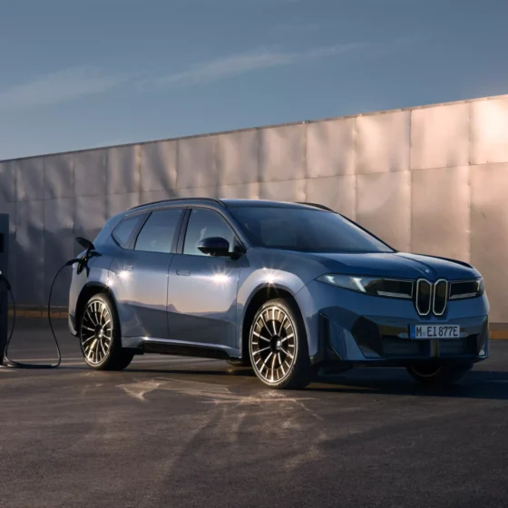 BMW iX3 charging at a public DC fast-charging station