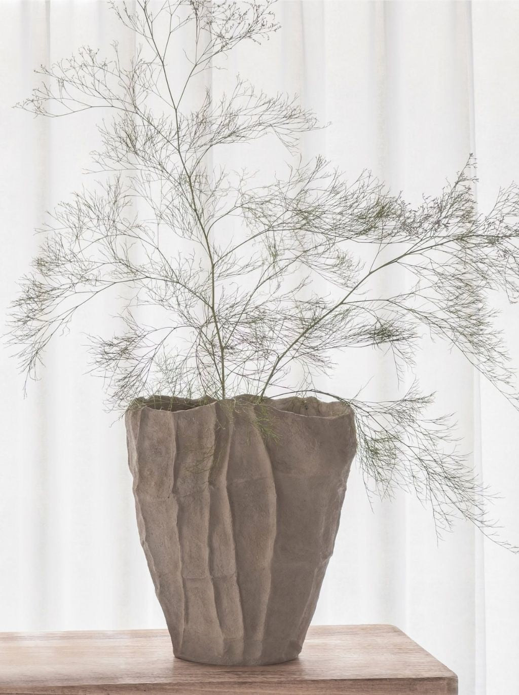 Mette Ditmer Art Piece Artistic Vase in Sand on a natural timber bench
