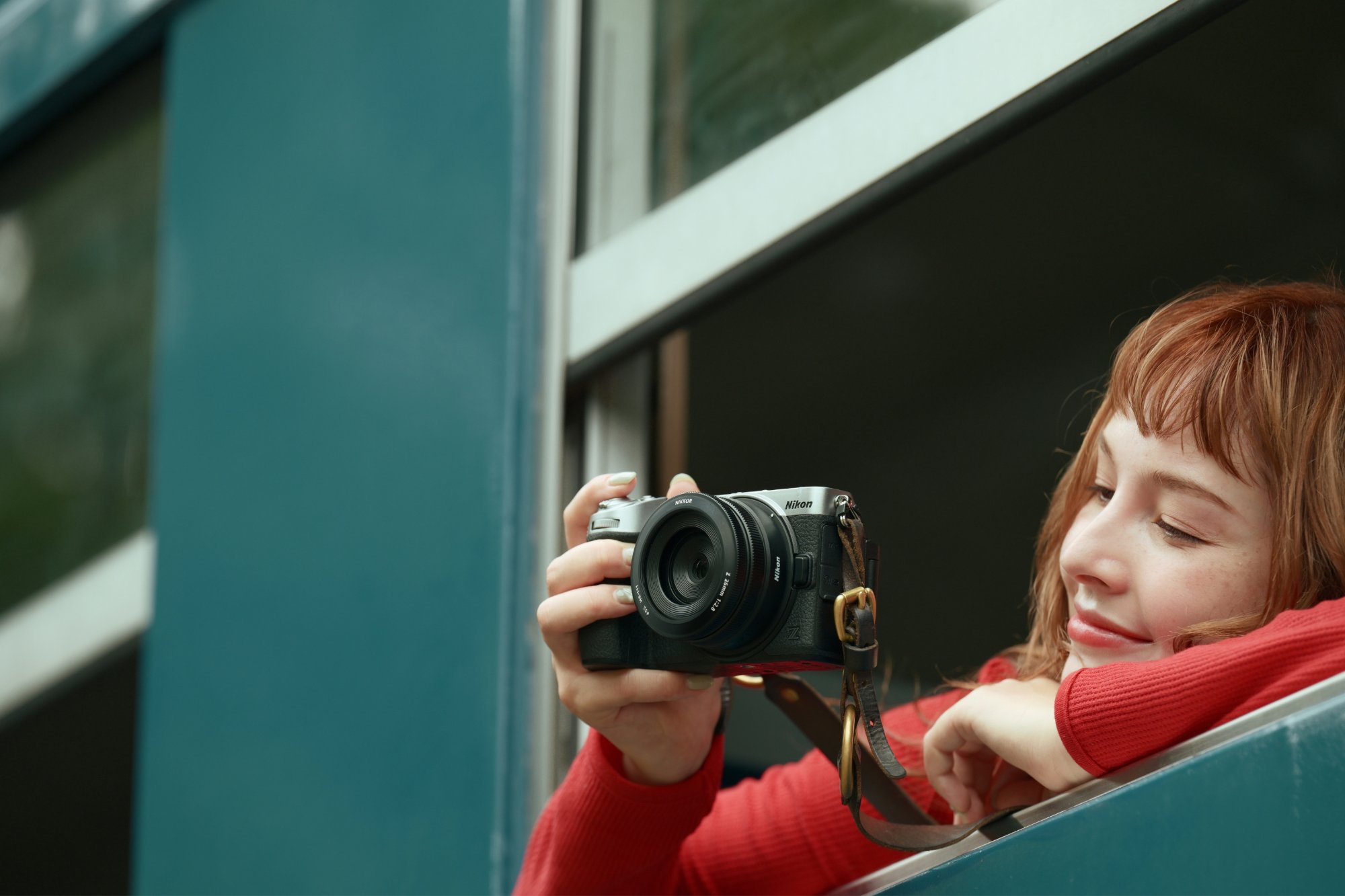 Nikon Z5IIc: A Full-Frame Mirrorless Camera Built to Make Photography Easy 2 Nikon Z5IIc being used outdoors on a balcony to take a photo
