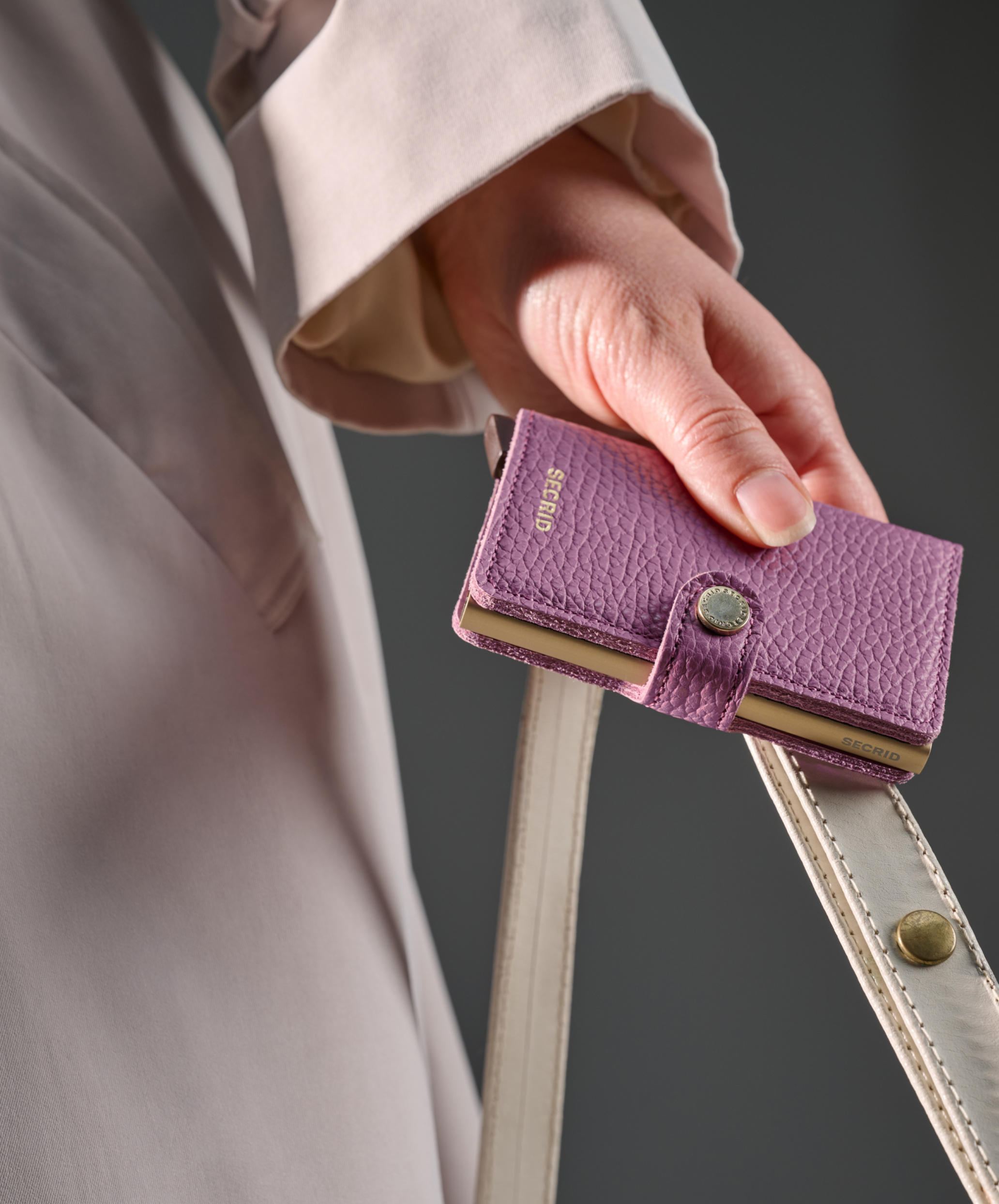 Secrid Miniwallet: The Dutch Design That Rebuilt the Wallet Around One Aluminium Card Holder 1 Secrid Miniwallet Pebble leather wallet colours lifestyle shot