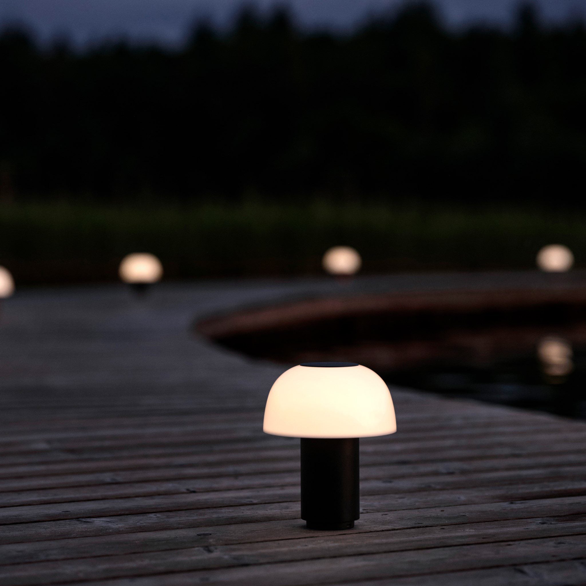 Zone Denmark Harvest Moon Lamp: A Portable Glow Shaped Like Its Name 2 Zone Denmark Harvest Moon Lamp black shade lit at night